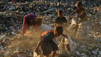 With the aid blockade, Palestinians have been left to starvation. Furthermore, ,majority of the children in Gaza have also been diagnosed with malnutrition as famine takes over parts of Gaza. In this image, displaced Palestinian children search for firewood and plastic in a landfill beside the makeshift tent camp where they are taking shelter, in Khan Younis. (AP) With the aid blockade, Palestinians have been left to starvation. Furthermore, ,majority of the children in Gaza have also been diagnosed with malnutrition as famine takes over parts of Gaza. In this image, displaced Palestinian children search for firewood and plastic in a landfill beside the makeshift tent camp where they are taking shelter, in Khan Younis. (AP)