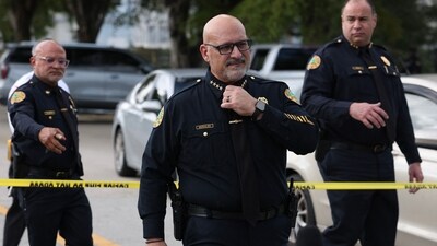 The City of Miami police Chief Manuel Morales arrives to speak with the media regarding two of his officers being shot (Getty Images via AFP) The City of Miami police Chief Manuel Morales arrives to speak with the media regarding two of his officers being shot (Getty Images via AFP)