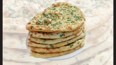 No one knows where the kulcha originated. But its younger cousin, the kulchette, has a cool origin story. (SHUTTERSTOCK) No one knows where the kulcha originated. But its younger cousin, the kulchette, has a cool origin story. (SHUTTERSTOCK)