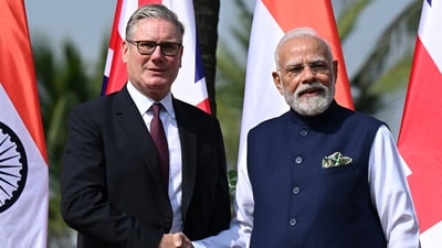 British Prime Minister Keir Starmer is greeted by Prime Minister of India Narendra Modi on his arrival at Raj Bhavan. (via REUTERS)