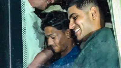 Shubman Gill and Yashasvi Jaiswal share a laugh while sitting in the team bus enroute to Gambhir's residence. (PTI) Shubman Gill and Yashasvi Jaiswal share a laugh while sitting in the team bus enroute to Gambhir's residence. (PTI)