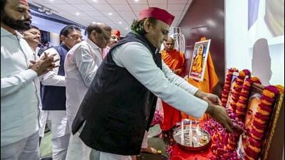 Samajwadi Party chief Akhilesh Yadav offering floral tribute to a portrait of BSP founder Kanshi Ram in Lucknow on Thursday. (PTI PHOTO) Samajwadi Party chief Akhilesh Yadav offering floral tribute to a portrait of BSP founder Kanshi Ram in Lucknow on Thursday. (PTI PHOTO)