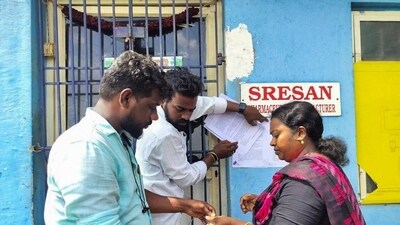 A Tamil Nadu health official sticks a notice outside the Sresan Pharmaceutical factory whose Coldrif cough syrup has been linked to the deaths of 17 children in Madhya Pradesh (Reuters) A Tamil Nadu health official sticks a notice outside the Sresan Pharmaceutical factory whose Coldrif cough syrup has been linked to the deaths of 17 children in Madhya Pradesh (Reuters)