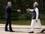 Canada's Prime Minister Mark Carney, left, and India's Prime Minister Narendra Modi reach to shake hands as Carney officially welcomes him to the G7 Summit in Kananaskis, Alberta, June 17, 2025. (AP)