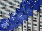 FILE PHOTO: European Union flags flutter outside the EU Commission headquarters in Brussels, Belgium July 16, 2025. REUTERS/Yves Herman//File Photo