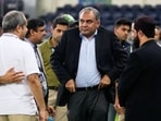 Mohsin Naqvi stands with officials on the field after India won the Asia Cup cricket final against Pakistan. Mohsin Naqvi stands with officials on the field after India won the Asia Cup cricket final against Pakistan.
