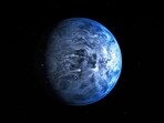 HD 189733 b sits 64 light years away and looks quite Earth-like. But its blue comes from an atmosphere so hot, it has turned the silica in its air into glass. (NASA / JPL-CALTECH) HD 189733 b sits 64 light years away and looks quite Earth-like. But its blue comes from an atmosphere so hot, it has turned the silica in its air into glass. (NASA / JPL-CALTECH)