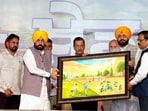 Punjab CM Bhagwant Mann with AAP national convener Arvind Kejriwal during the foundation stone laying ceremony of more than 3,000 sports fields in Bathinda on Thursday. (Sourced) Punjab CM Bhagwant Mann with AAP national convener Arvind Kejriwal during the foundation stone laying ceremony of more than 3,000 sports fields in Bathinda on Thursday. (Sourced)