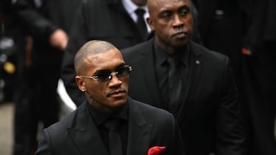 Former British boxing champion Nigel Benn and his son, professional boxer Conor Benn, arrived at Manchester Cathedral to attend the funeral of the late Ricky Hatton. (Photo by Oli SCARFF / AFP) (AFP) Former British boxing champion Nigel Benn and his son, professional boxer Conor Benn, arrived at Manchester Cathedral to attend the funeral of the late Ricky Hatton. (Photo by Oli SCARFF / AFP) (AFP)