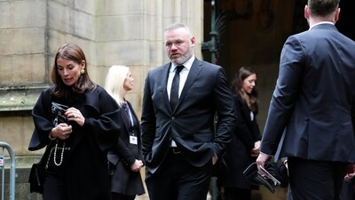 Wayne Rooney was spotted with his wife, Coleen Rooney, departing Manchester Cathedral following the funeral service for Ricky Hatton. (Martin Rickett/PA via AP) (AP) Wayne Rooney was spotted with his wife, Coleen Rooney, departing Manchester Cathedral following the funeral service for Ricky Hatton. (Martin Rickett/PA via AP) (AP)