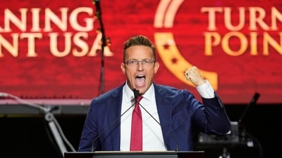 Benny Johnson speaks at a memorial for conservative activist Charlie Kirk, Sunday, Sept. 21, 2025, at State Farm Stadium in Glendale, Ariz. (AP) Benny Johnson speaks at a memorial for conservative activist Charlie Kirk, Sunday, Sept. 21, 2025, at State Farm Stadium in Glendale, Ariz. (AP)
