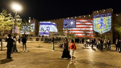 United States and Israel flags are projected on the walls of the Old city of Jerusalem in celebration after Israel and Hamas agreed to the first phase of Donald Trump's plan to end the war in Gaza. (REUTERS)