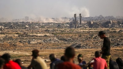 In Nusseirat camp in the centre of the enclave, some Israeli soldiers dismantled their position and headed east towards the Israeli border, but other troops remained in the area after gunfire was heard in the early hours of Friday. (AFP)