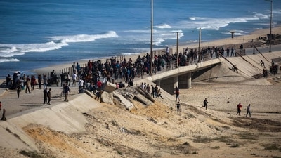 Israeli forces pulled out from the road along the Mediterranean coast into Gaza City, where hundreds of people had gathered, hoping to return to the enclave's main urban centre, which has been under Israeli assault for the past month. (AFP)