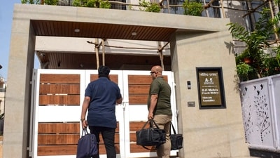 Lokayukta personnel during a raid on the residence of Madhya Pradesh Public Works Department engineer GP Mehra in Bhopal on Thursday. (PTI) Lokayukta personnel during a raid on the residence of Madhya Pradesh Public Works Department engineer GP Mehra in Bhopal on Thursday. (PTI)