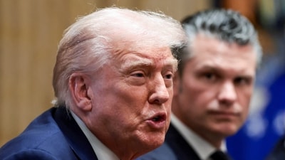 Donald Trump and Defense Secretary Pete Hegseth attend a cabinet meeting at the White House (REUTERS)