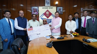 Chief Minister Pushkar Singh Dhami presents financial assistance cheques to the families of UPNL employees who died in road accidents. Chief Minister Pushkar Singh Dhami presents financial assistance cheques to the families of UPNL employees who died in road accidents.