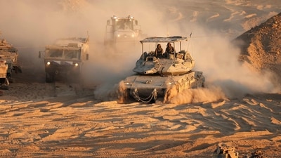 In Khan Younis, in the southern Gaza Strip, some Israeli troops pulled back from the eastern area near the border, but tank shelling was heard, according to residents in contact with Reuters. (AFP)