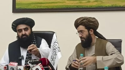 Taliban foreign minister Amir Khan Muttaqi was seated below a painting depicting the 6th century Buddha statues at Bamiyan that were destroyed on the orders of former Taliban chief Mullah Omar. (PTI) Taliban foreign minister Amir Khan Muttaqi was seated below a painting depicting the 6th century Buddha statues at Bamiyan that were destroyed on the orders of former Taliban chief Mullah Omar. (PTI)