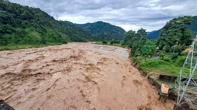 Teesta flows in full spate as flood like situation intensifies in Darjeeling and adjoining districts of Jalpaiguri and Kalimpong. (NDRF via PTI) Teesta flows in full spate as flood like situation intensifies in Darjeeling and adjoining districts of Jalpaiguri and Kalimpong. (NDRF via PTI)