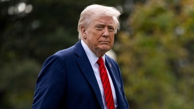 Donald Trump walks on the South Lawn of the White House after arriving on Marine One in Washington, DC (Bloomberg) Donald Trump walks on the South Lawn of the White House after arriving on Marine One in Washington, DC (Bloomberg)