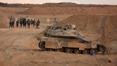 Gaza's civil defence agency said Israeli troops and armoured vehicles were pulling back from forward positions in both Gaza City and Khan Yunis, and displaced Palestinian civilians told AFP they hoped to return home.&nbsp; (AFP)
