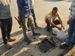 Gurugram, India-October 10, 2025: A government official team take the sample of sector-9 road near Basai flyover, in Gurugram, India, on Friday, 10 October 2025. (Photo/Hindustan Times)(Pic to go with Abhishek Bahl's story)