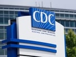 A sign for the CDC sits outside of their facility at the Centers for Disease Control and Prevention (CDC) Roybal campus