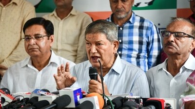 File photo of Congress leaders Harish Rawat and Pritam Singh, with other party members, addresses a press conference (Virender Singh Negi) File photo of Congress leaders Harish Rawat and Pritam Singh, with other party members, addresses a press conference (Virender Singh Negi)