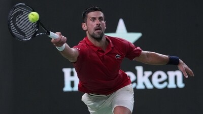 Serbia's Novak Djokovic halted play in the opening set at 3-4. (AP) Serbia's Novak Djokovic halted play in the opening set at 3-4. (AP)
