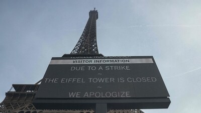 This photograph shows a view of a placard reading "Due to a strike the Eiffel Tower is closed, we apologize" with the Eiffel Tower in the background, amid a nation-wide day of strike called by France's eight biggest workers unions for "social justice" measures, in Paris, on October 2, 2025. (AFP) This photograph shows a view of a placard reading "Due to a strike the Eiffel Tower is closed, we apologize" with the Eiffel Tower in the background, amid a nation-wide day of strike called by France's eight biggest workers unions for "social justice" measures, in Paris, on October 2, 2025. (AFP)