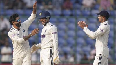 India's Ravindra Jadeja (L) celebrates with captain Shubman Gill (R) after taking the wicket of West Indies' Roston Chase. (PTI) India's Ravindra Jadeja (L) celebrates with captain Shubman Gill (R) after taking the wicket of West Indies' Roston Chase. (PTI)