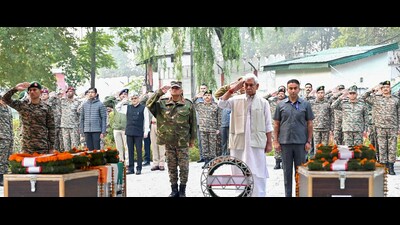 Jammu and Kashmir Lieutenant Governor Manoj Sinha pays homage to Lance Havildar Palash Ghosh and Lance Naik Sujay Ghosh, who laid down their lives for the nation while conducting counter-terror operations in the Kishtwar Range of Kokernag, on Saturday. (ANI)