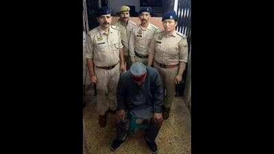 Ram Kumar Bindal, 81, the elder brother of the Himachal Pradesh BJP chief Rajeev Kumar Bindal, in Solan police custody on Friday.