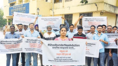 Thane, India - October -11, 2025: Anger Among Ghodbunder Road Residents Ñ Memorandum Submitted to Police, Despite holding repeated protests, residents of Ghodbunder Road continue to be denied justice. Frustrated by the inaction, locals gathered outside the Kasarvadavali Police Station on Saturday and submitted a memorandum to senior police officials. In the memorandum, citizens have demanded that the poor condition of Ghodbunder Road be urgently repaired and strict measures be taken to prevent frequent accidents that occur due to bad road conditions. The residents also highlighted that several people have lost their lives in recent accidents caused by the deteriorating roads, and it is high time strict action is taken to stop such tragedies,in Thane ,in Mumbai, India, on, Saturday, October -11, 2025. ( Praful Gangurde / HT Photo ) Thane, India - October -11, 2025: Anger Among Ghodbunder Road Residents Ñ Memorandum Submitted to Police, Despite holding repeated protests, residents of Ghodbunder Road continue to be denied justice. Frustrated by the inaction, locals gathered outside the Kasarvadavali Police Station on Saturday and submitted a memorandum to senior police officials. In the memorandum, citizens have demanded that the poor condition of Ghodbunder Road be urgently repaired and strict measures be taken to prevent frequent accidents that occur due to bad road conditions. The residents also highlighted that several people have lost their lives in recent accidents caused by the deteriorating roads, and it is high time strict action is taken to stop such tragedies,in Thane ,in Mumbai, India, on, Saturday, October -11, 2025. ( Praful Gangurde / HT Photo )
