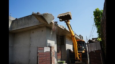 The gram panchayat had earlier served three notices to the accused couple, asking them to vacate the encroached panchayat land (HT Photo)