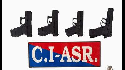 The recovered weapons include three 9mm pistols and five .30 bore pistols, along with magazines (HT Photo) The recovered weapons include three 9mm pistols and five .30 bore pistols, along with magazines (HT Photo)