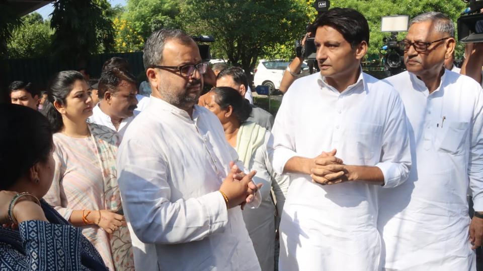 Congress leader Deepender Hooda with a relative of the deceased IPS officer at their residence in Chandigarh on Saturday. (Sanjeev Sharma/HT) Congress leader Deepender Hooda with a relative of the deceased IPS officer at their residence in Chandigarh on Saturday. (Sanjeev Sharma/HT)