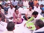 Chief minister Nayab Singh Saini offering condolences to Y Puran Kumar’s wife and senior IAS officer Amneet P Kumar (centre) in Chandigarh on Thursday. (HT Photo)