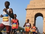 Kenya’s Alex Matata on way to winning the men’s elite race in the Vedanta Delhi Half Marathon in New Delhi on Sunday. (Arvind Yadav/HT Photo)