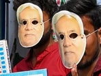JDU supporters wear masks of CM Nitish Kumar and hold EVM replicas as they gear up for the Bihar assembly election 2025 campaign in Patna on Sunday, October 12. JDU supporters wear masks of CM Nitish Kumar and hold EVM replicas as they gear up for the Bihar assembly election 2025 campaign in Patna on Sunday, October 12.
