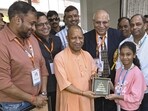 Uttar Pradesh chief minister Yogi Adityanath at the inaugural ceremony of the International Carpet Fair in Bhadohi on Saturday. (PTI PHOTO)