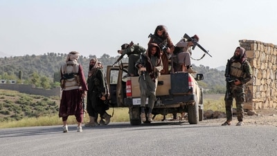 Taliban security personnel arrive to patrol along a road in the Zazai Maidan district of Khost province near the Afghanistan-Pakistan border on October 12, 2025. (AFP) Taliban security personnel arrive to patrol along a road in the Zazai Maidan district of Khost province near the Afghanistan-Pakistan border on October 12, 2025. (AFP)