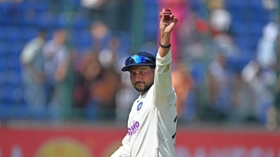 Kuldeep Yadav celebrates after taking five-wicket haul during the third day of the second and last Test cricket match between India and West Indies (AFP) Kuldeep Yadav celebrates after taking five-wicket haul during the third day of the second and last Test cricket match between India and West Indies (AFP)