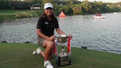 Singapore’s Shannon Tan poses with the trophy after winning the Hero Women’s Indian Open 2025 at the DLF Golf and Country Club course in Gurgaon on Sunday. (HT Photo)