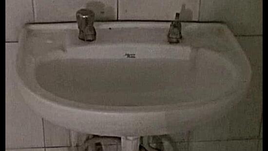 A broken tap at a public toilet in Sector 15 market, Panchkula. (HT)
