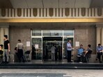 FILE: Police officers guard at the main entrance door to a building where Zion church is located after the church was shutdown by authorities in Beijing, Sept. 11, 2018. (AP Photo/Andy Wong, File) FILE: Police officers guard at the main entrance door to a building where Zion church is located after the church was shutdown by authorities in Beijing, Sept. 11, 2018. (AP Photo/Andy Wong, File)