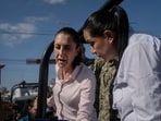 Mexican President Claudia Sheinbaum, and Veracruz Gov. Rocío Nahle García survey authorities' aid distribution in Poza Rica, Mexico on Sunday.