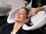 Exercise caution when you are getting your hair washed at a salon. 