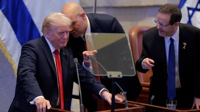 Donald Trump addresses the Knesset, Israel’s parliament on Monday (via REUTERS)